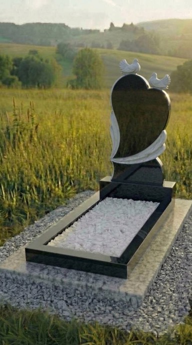Памятник сердце из карельского гранита с голубями, резной гранитный памятник для женщины