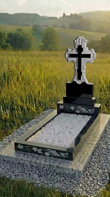 Резной крест на памятнике из чёрного гранита с декоративными элементами, гранит габбро