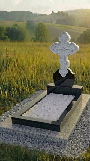 Гранитный памятник с резным православным крестом из чёрного гранита габбро